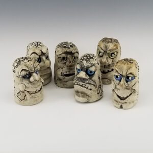 Five ceramic dude characters